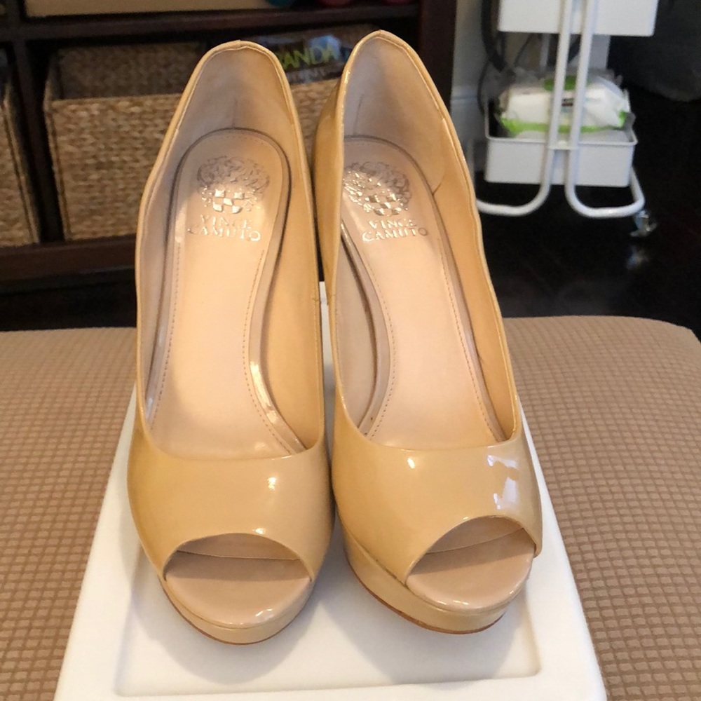 Vince Camuto high heel open toe platform shoe.